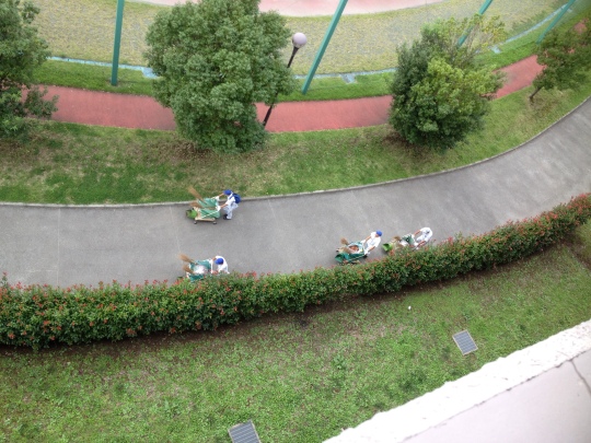 So nearly every day these guys come with their carts and brooms to clean the leaves away. Seems a little obsessive to me but I guess it looks nice and they aren't using petrol powered blowers which is lovely :) This is from m balcony.