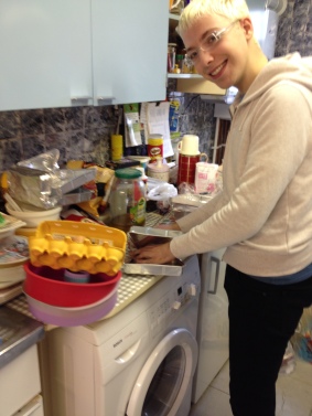 Sam folding our tins with his super clever foldy method (the tins were too big)
