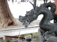 Darn cool dragon to wash your filthy hands and mouth before you go near the shrine